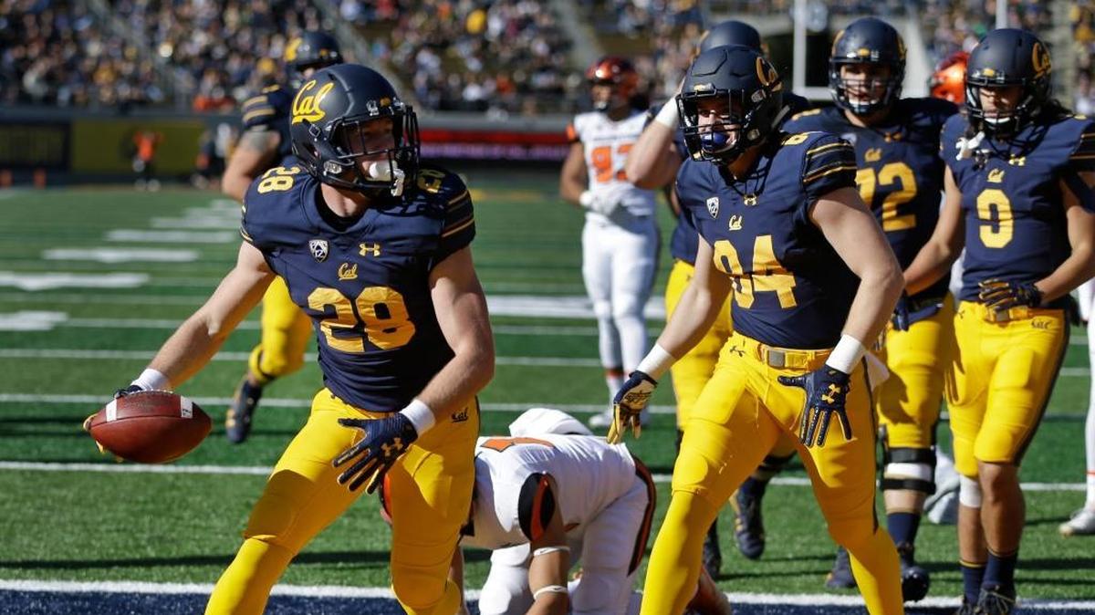 Mission Prep alum and Cal running back Patrick Laird, left, celebrates after scoring a touchdown against Oregon State on Saturday, November 4, 2017, in Berkeley, California.
