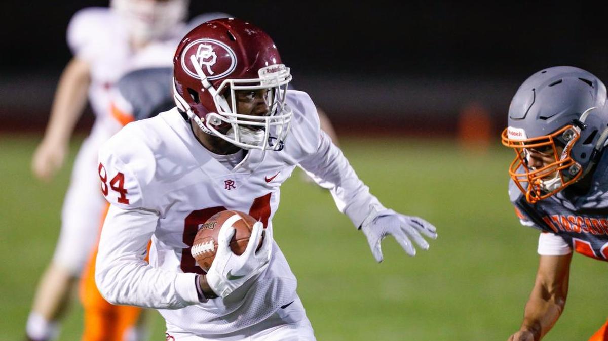 Paso Robles wide receiver Levi Marshall carries the ball during the Bearcats’ 28-24 win against Atascadero in a Mountain League football game Friday night in Atascadero, California.