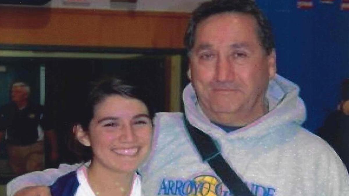 Former Arroyo Grande volleyball coach Ernie Santa Cruz with his daughter Leanne in 2006.