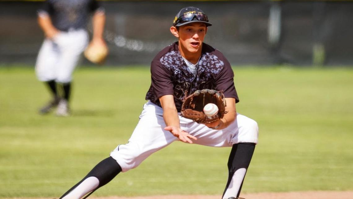 San Luis Obispo’s Brooks Lee turns a double play during a playoff game last season. Photo by Joe Johnston 05-20-16