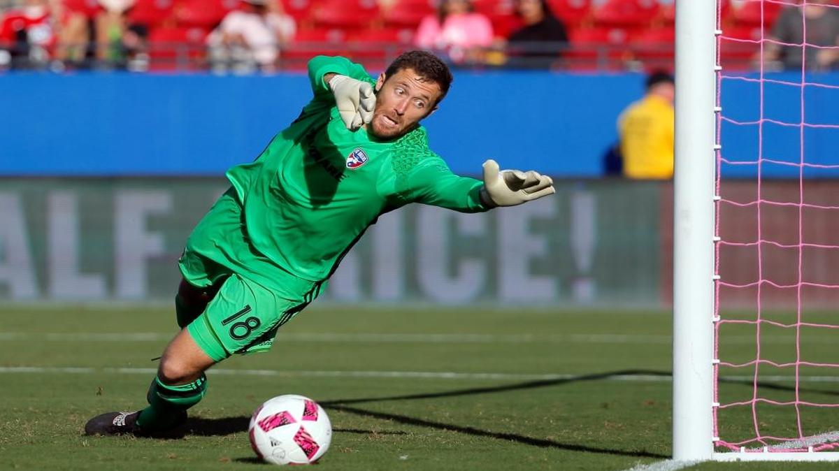 FC Dallas goalkeeper Chris Seitz is unable to stop a shot for a goal by Seattle Sounders midfielder Nicolas Lodeiro in the first half of an MLS soccer match, Sunday, Oct. 16, 2016, in Frisco, Texas.