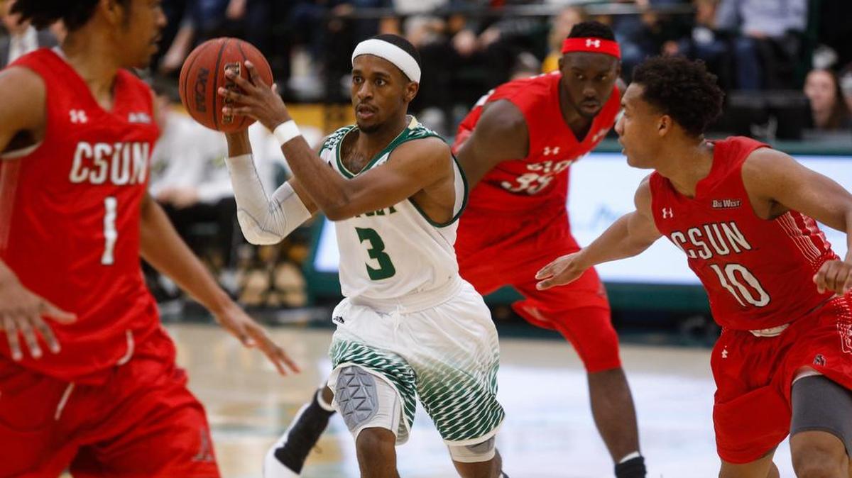 Cal Poly guard Donovan Fields makes a pass against CSUN in the Mustangs Big West home opener at Robert A. Mott Athletics Center on Saturday, Jan. 12.