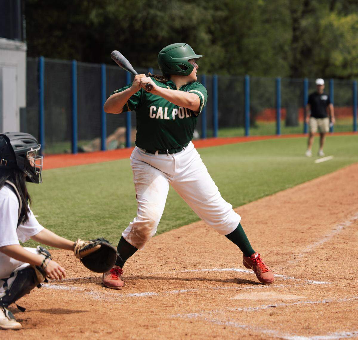 Brenna Hayden hits for Cal Poly’s women’s club baseball team.