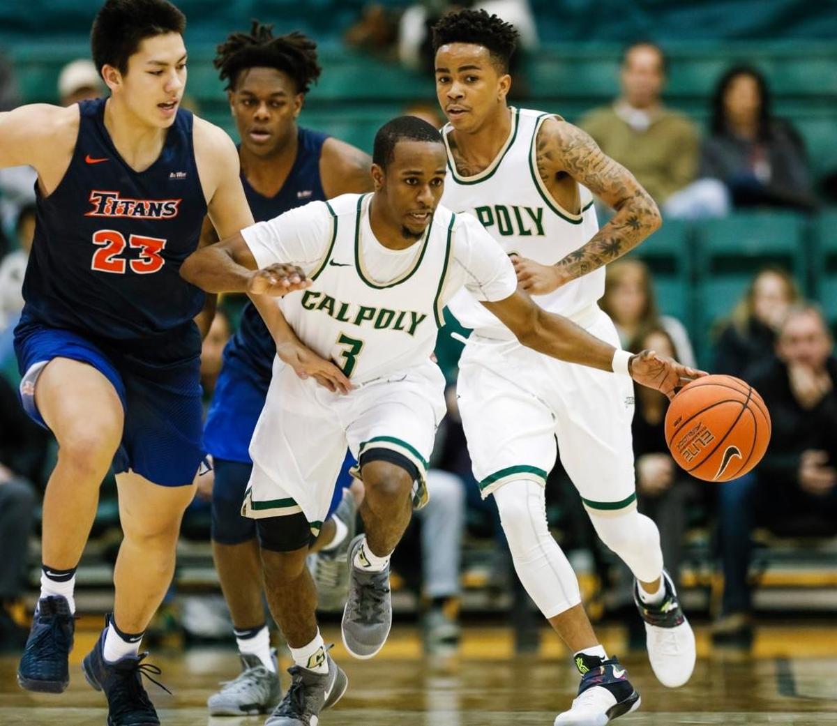 Cal Poly junior guard Donovan Fields, shown here with the ball in a game last season, leads the nation in free throw percentage after making his first 25 shots of the season. Photo by Joe Johnston 01-12-17