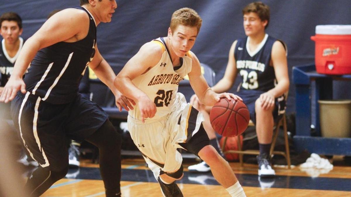 Bradley Mickey dribbles as Arroyo Grande hosted Dos Pueblos in a high school basketball game Wednesday.