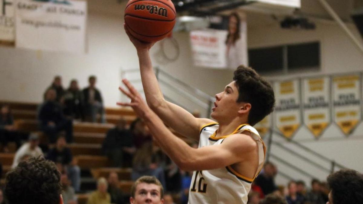 Arroyo Grande junior Caleb Whalen hit a layup at the buzzer to beat St. Joes on Monday and keep Arroyo Grande in second place in the PAC 8 with four games to go.